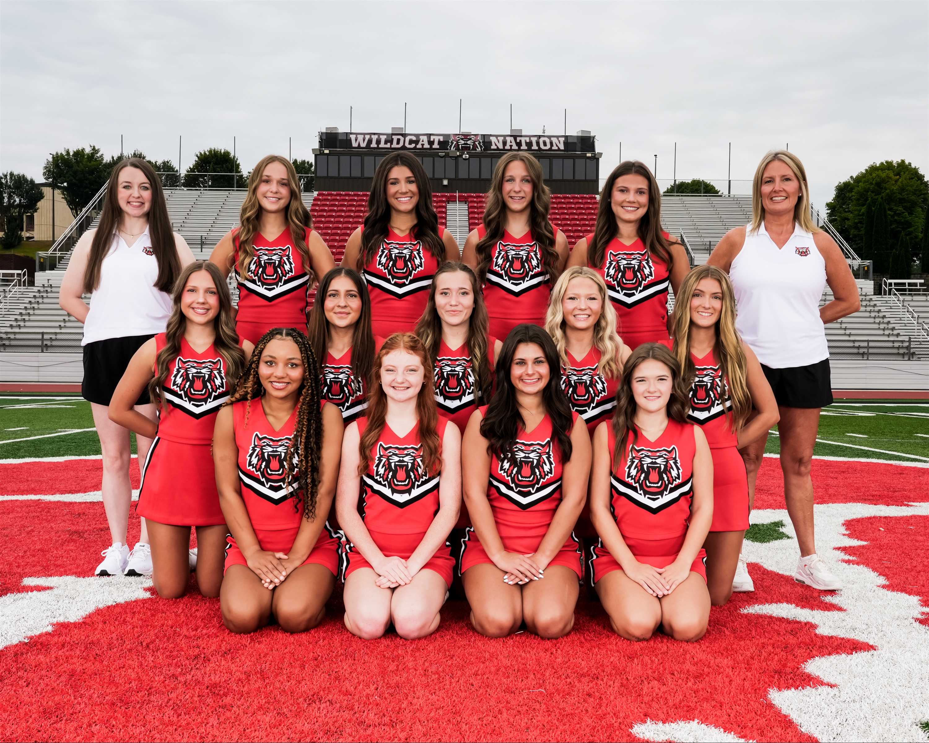 Varsity Cheerleaders and coaches